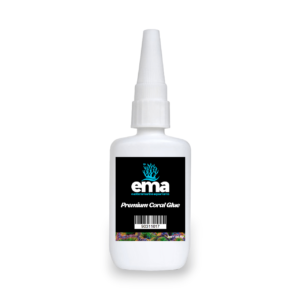 A bottle of EMA premium coral glue with a black label and the Eastern Marine Aquariums logo on a white container.